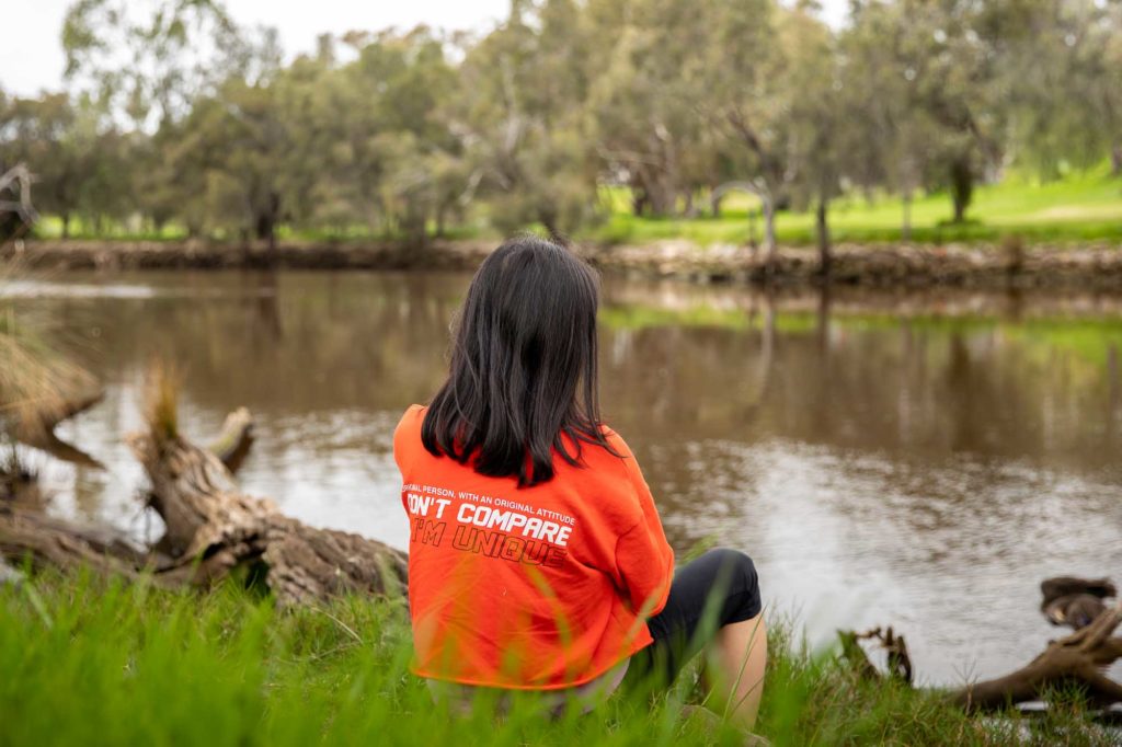 Siska_sitting by the river